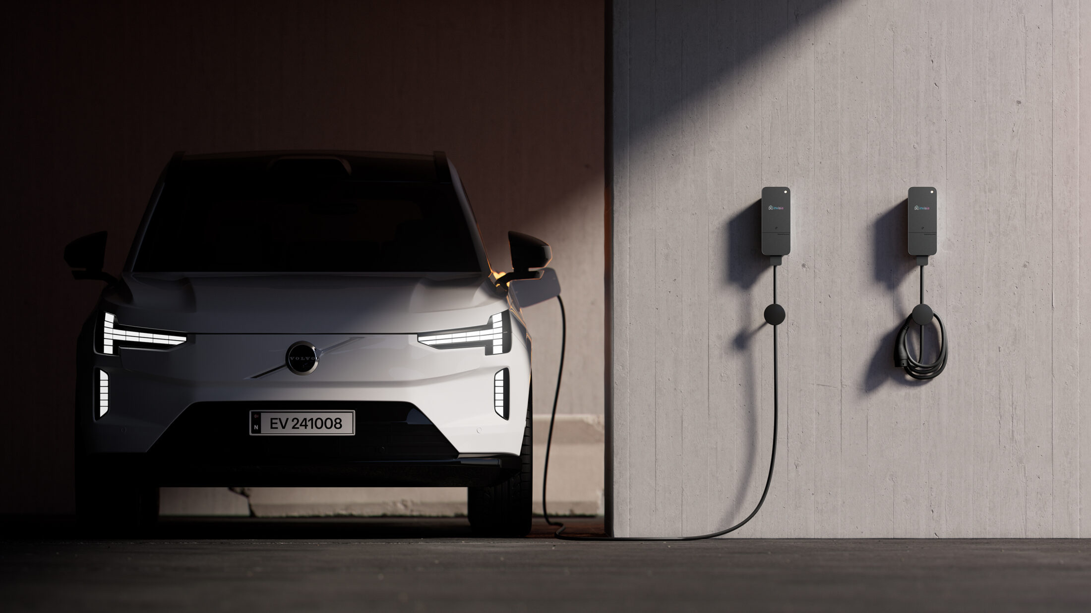 Electric car charging in a garage using white-label amina EV chargers with invisia branding, demonstrating customised, fully branded charging infrastructure for energy partners.