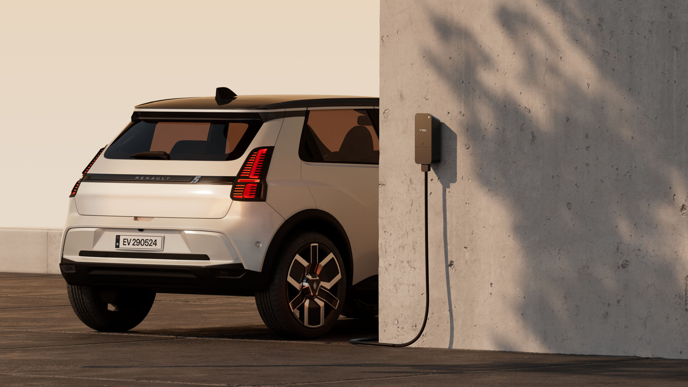 Renault electric vehicle charging at Amina C wall-mounted charger in Verdo partner deployment, demonstrating real-world CPO charging infrastructure installation